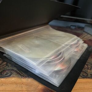 Black CD/DVD Storage Binder full of movies , some not shown